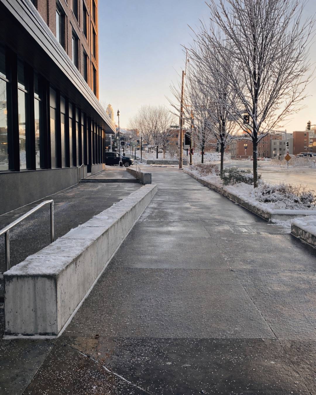 Photo of a cleared walkway after a snow storm after commercial snow plowing Woburn.